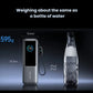 Anker 25K power bank size comparison next to water bottle, 15.7cm tall, 5.4cm wide, weighing 595g for travel
