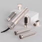 Silver 6-in-1 Ultra Styler hair styling tool displayed with interchangeable attachments on minimalist white block. Features ergonomic grip, sleek finish, and advanced airflow system for smooth styling.