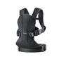Black BabyBjörn Carrier One Cotton baby carrier front view showing ergonomic design, padded shoulder straps, and adjustable buckles for newborn to toddler carry.