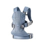 Light blue BabyBjörn Carrier One Cotton baby carrier with breathable cotton fabric, wide waist belt, and ergonomic support for comfortable babywearing.