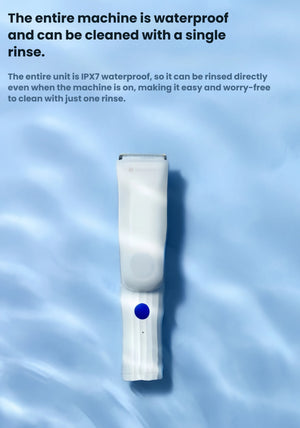 Babycare baby hair clipper floating on water surface, showcasing full-body IPX7 waterproof design that allows rinsing while powered on