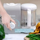 Parent's hand turning the Beaba Babycook Express dial to switch between quick and regular steaming modes—intuitive one-button control for fast or gentle cooking.
