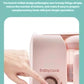 Close-up of hand pressing the one-click button on the Beaba Babycook Solo—simple, intuitive control for quick steam cooking, blending, and reheating without complicated settings.