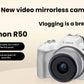  Hero shot of white Canon EOS R50 mirrorless camera with RF-S 18-45 mm lens, highlighting 24.2 MP sensor and 6K oversampled 4K video.