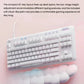 Angled view of the G713 keyboard with the included cloud-shaped palm rest, showcasing the compact 87-key design and two-stage height adjustment for ergonomic gaming.