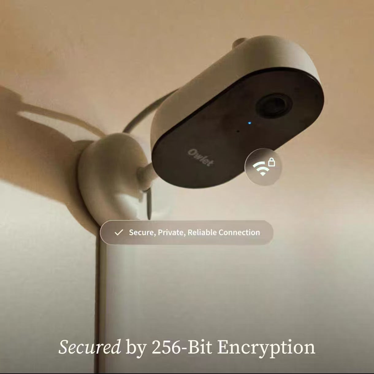 Owlet Dream Sight baby monitor mounted on wall with secure connection icon, secured by 256-bit encryption for private and reliable video streaming