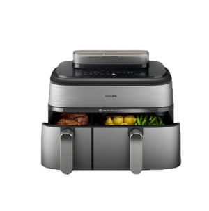 The Philips 5000 Series XXL Dual Basket Airfryer shown from the front with both drawers open, displaying cooked meat in the large basket and vegetables in the smaller one.