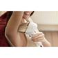 Image of a handheld IPL (Intense Pulsed Light) hair removal device in a sleek white and rose gold design. The device comes with three interchangeable attachment heads for different body areas, each designed with specialized treatment windows. The attachments are color-coded for easy identification and suited for face, body, and precision areas
