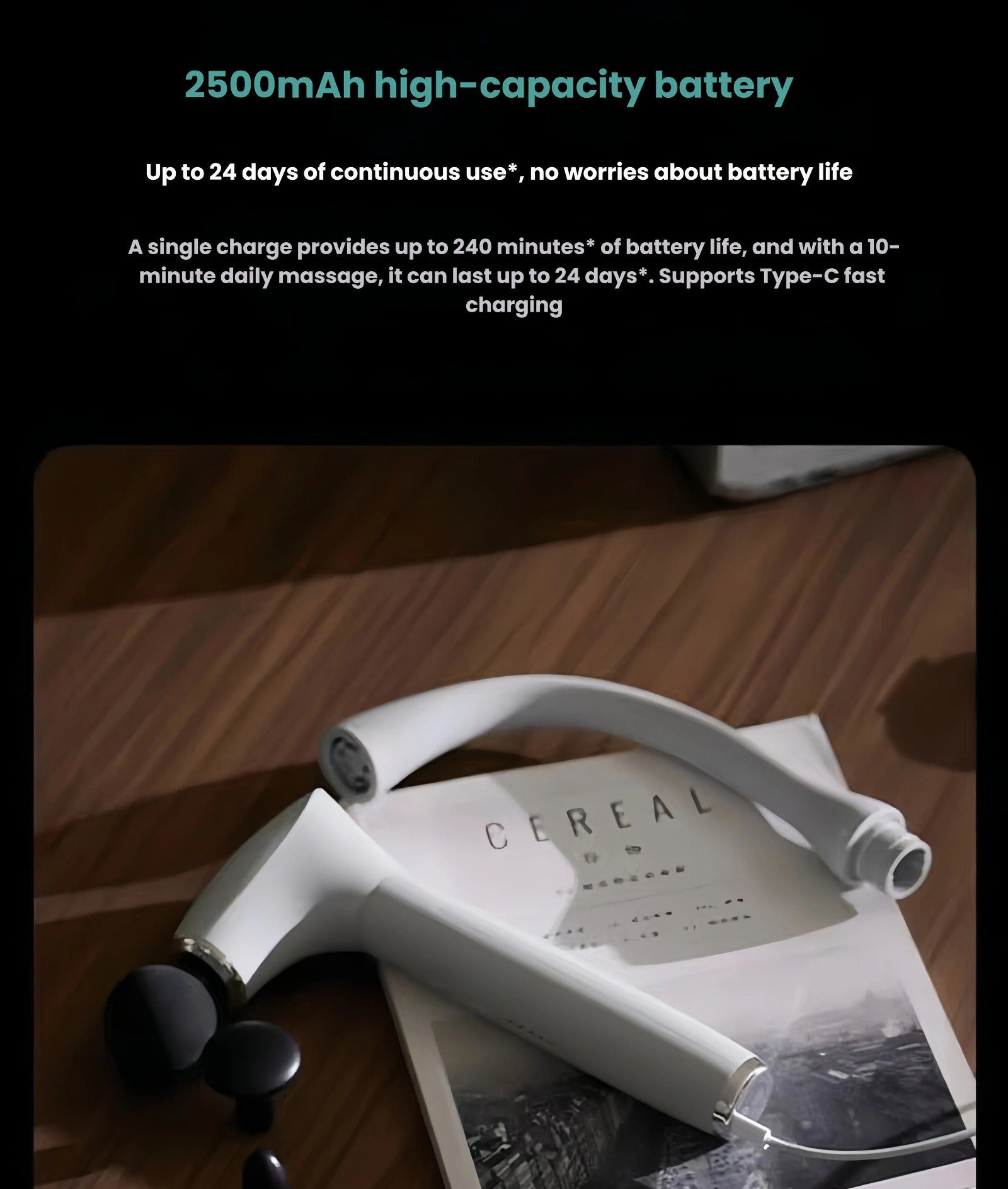 The Philips massage gun resting on a magazine, showcasing its sleek design and Type-C charging port. Features a 2500mAh battery that lasts up to 240 minutes per charge—ideal for daily use over 24 days.