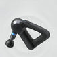 Studio shot of black Theragun Elite G5 massage gun with Bluetooth badge, emphasizing sleek ergonomic triangle design.