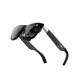 Studio shot of black XREAL One AR glasses with tinted lenses and metallic accents.